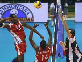 Wilfredo Venero Leon rises for a spike at a tournament in 2010.