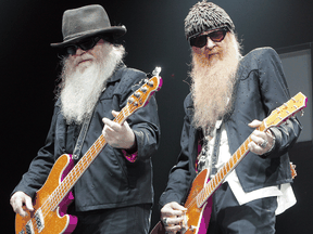 Dusty Hill, left, with guitarist Billy Gibbons during a ZZ Top show in Calgary in 2009.