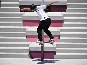 Japan's Yukito Aoki competes in the men's street prelims heat 4 during the Tokyo 2020 Olympic Games at Ariake Sports Park Skateboarding in Tokyo on July 25, 2021. (Photo by Jeff PACHOUD / AFP)