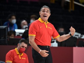 Spain's coach Sergio Scariolo gestures from the sidelines during the men's preliminary round group C basketball match between Japan and Spain during the Tokyo 2020 Olympic Games at the Saitama Super Arena in Saitama on July 26, 2021. (Photo by Aris MESSINIS / AFP)