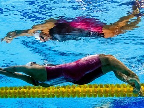 Canada's Kylie Masse competes in a heat of the women's 100M Backstroke during the swimming competition at the 2017 FINA World Championships in Budapest