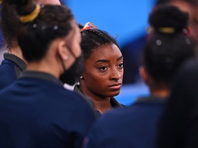 Tokyo 2020 Olympics - Gymnastics - Artistic - Women's Individual All-Around - Qualification - Ariake Gymnastics Centre, Tokyo, Japan - July 25, 2021. Simone Biles of the United States looks on during competition.