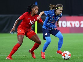 Canada and Japan earned a point for the tie and currently sit behind Great Britain in Group E, who earned three points for its 2-0 win against Chile in its opener Wednesday. Great Britain face Japan on Saturday.