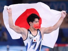 TOKYO, JAPAN - JULY 28: Daiki Hashimoto of Team Japan celebrates winning gold during the Men's All-Around Final on day five of the Tokyo 2020 Olympic Games at Ariake Gymnastics Centre on July 28, 2021 in Tokyo, Japan.