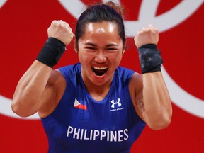 Weightlifter Hidilyn Diaz won the first-ever Olympic gold medal for the Philippines, ending the nation's 97-year drought.