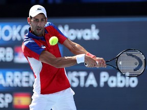 TOKYO, JAPAN - JULY 31: Novak Djokovic of Team Serbia plays a backhand during his Men's Singles Bronze Medal match against Pablo Carreno Busta of Team Spain on day eight of the Tokyo 2020 Olympic Games at Ariake Tennis Park on July 31, 2021 in Tokyo, Japan.