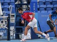 A day after being stunned by Germany's Alexander Zverev in the Olympic semi-finals, Djokovak, the most dominant player in men's tennis, lost Saturday's bronze medal match to Spain's Pablo Carreno Busta, 6-4, 6-7 (3), 6-3, with some racquet abuse along the way.