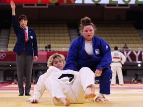 The International Judo Federation has praised a Saudi Arabian woman for competing against an Israeli foe at the Tokyo Olympics after two other athletes from Arab countries refused to do the same.