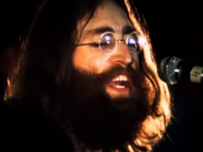 John Lennon performs at the Toronto Rock and Roll Revival in 1969.