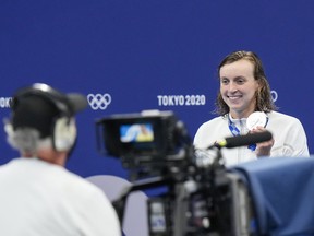 Katie Ledecky, with her silver medal for the 400-meter freestyle, works with businesses that resonate with her. MUST CREDIT: Washington Post photo by Toni L. Sandys