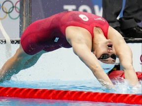 Canada's Kylie Masse competes in the women's 100m backstroke final event during the Tokyo Olympics.