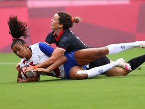 Anne-Cecile Ciofani of France in action with Elissa Alarie of Canada.