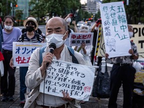 TOKYO, JAPAN - JULY 18: A protester demonstrates against the forthcoming Tokyo Olympic Games.
