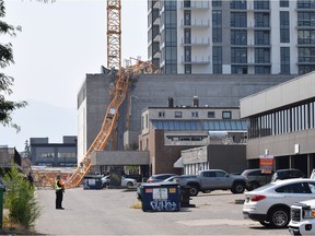 Crane had people on board when it collapsed at high-rise construction site in Kelowna.