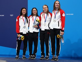 All 12 swimmers from Australia, Canada and the United States on the podium for the women’s 4x100 freestyle relay ceremony went mask-less, grinning to photographers. In Tokyo, masks are mandatory for all venues — inside and out — as part of strict measures to battle the coronavirus.