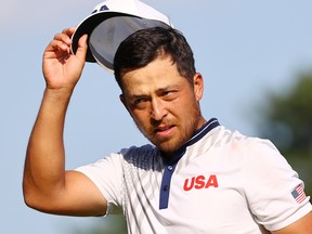Xander Schauffele battled his swing for much of the third round but birdied the final hole to follow Friday's superb 63 with a three-under 68 on Saturday to reach 14-under par.