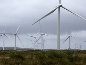 Wind turbines stand at Whitelee Windfarm, the U.K.'s largest onshore windfarm, operated by ScottishPower Renewables, a unit of Iberdrola SA, on Eaglesham Moor near Glasgow, U.K., on Monday, Aug. 11, 2014. Scottish independence risks undermining investment in low-carbon energy because the smaller nation wouldn't be able to afford the same level of subsidies as Britain combined, the U.K. Department of Energy and Climate Change said in April.
