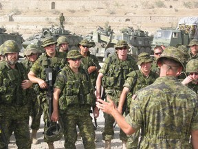 Captain Cayle Oberwarth (R), gives a threat briefing to newly-arrived Canadian soldiers with the International Security Assistance Force (ISAF) in Kabul, Afghanistan. Canadian troops are in Afghanistan as part of Operation ATHENA, Canada's contribution ISAF in Kabul. Canada will contribute about 1,900 troops to the mission in the Afghan capital this summer, making the Canadian contingent the second largest in ISAF. Currently this mission involves about 5,000 troops from 29 nations.