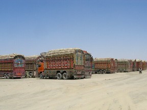 Trucks loaded with supplies wait to cross into Afghanistan at the Friendship Gate crossing point, in the Pakistan-Afghanistan border town of Chaman, Pakistan August 19, 2021.