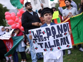 Protesters gather on Parliament Square to protest against the Taliban take over of Afghanistan on August 18, 2021 in London, United Kingdom.