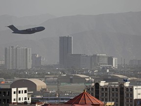 A U.S. Air Force aircraft takes off from the military airport in Kabul on Aug. 27.