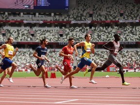Marco Arop of Team Canada leads the field in round one of the Men's 800m heats on day eight of the Tokyo 2020 Olympic Games at Olympic Stadium on July 31, 2021 in Tokyo, Japan. (Photo by Cameron Spencer/Getty Images)