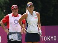 American stalwart Lexi Thompson, one of the pre-tournament favourites, was left without her regular caddie Jack Fulghum after he couldn't continue due to the heat.