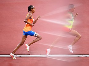 Sifan Hassan of Team Netherlands competes in the Women's 10,000m Final on day fifteen of the Tokyo 2020 Olympic Games at Olympic Stadium on August 07, 2021 in Tokyo, Japan. (Photo by Matthias Hangst/Getty Images)