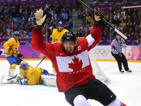 Sidney Crosby #87 of Canada celebrates after scoring his team's second goal in the second period during the Men's Ice Hockey Gold Medal match against Sweden on Day 16 of the 2014 Sochi Winter Olympics at Bolshoy Ice Dome on February 23, 2014 in Sochi, Russia.  (Photo by Martin Rose/Getty Images)