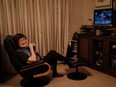 An elderly woman watches the Tokyo 2020 Olympic Games from her home in Yokohama, Japan, on July 26.