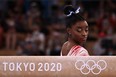 USA's Simone Biles gets ready to compete in the artistic gymnastics women's balance beam final of the Tokyo 2020 Olympic Games at Ariake Gymnastics Centre in Tokyo on August 3, 2021. (Photo by Lionel BONAVENTURE / AFP) (Photo by LIONEL BONAVENTURE/AFP via Getty Images)