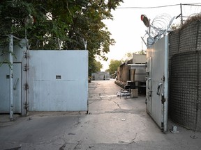 The entrance gate of the Canadian embassy is pictured after the evacuation in Kabul on Aug. 15, 2021.