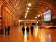 Police officers patrol through the quiet Central Station in the city centre during a lockdown to curb the spread of COVID-19 in Sydney, Australia, Aug. 12, 2021.