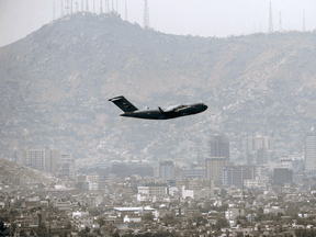 A U.S. Air Force aircraft takes off from the airport in Kabul on August 30, 2021.