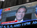 A farewell speech by New York Governor Andrew Cuomo is broadcast live on a screen in Times Square on his final day in office in Manhattan, August 23, 2021.