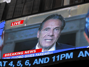 A farewell speech by New York Governor Andrew Cuomo is broadcast live on a screen in Times Square on his final day in office in Manhattan, August 23, 2021.