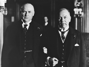Political rivals R.B. Bennett and Mackenzie King shown linking arms. Both men were lifelong bachelors rarely seen in the company of women, spurring decades of speculation that both leaders were secretly gay.