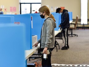 Georgia voters cast their ballots at the Chamblee Civic Center during the Georgia runoffs elections on January 5, 2020.