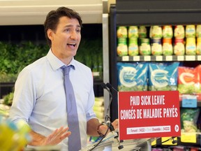 Canada's Liberal Prime Minister Justin Trudeau visits the Foodfare grocery store during his election campaign tour in Winnipeg, Manitoba, Canada August 20, 2021.
