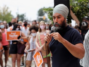 New Democratic Party (NDP) leader Jagmeet Singh speaks as he supports local candidate Paul Taylor, during his election campaign tour in Toronto, Ontario, Canada August 21, 2021. REUTERS/Chris Helgren