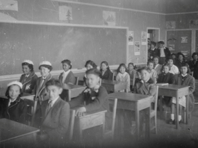 In this undated photo, students sit in a classroom at the Kuper Island Indian Residential School, which operated from 1890-1975, near Chemainus, British Columbia.