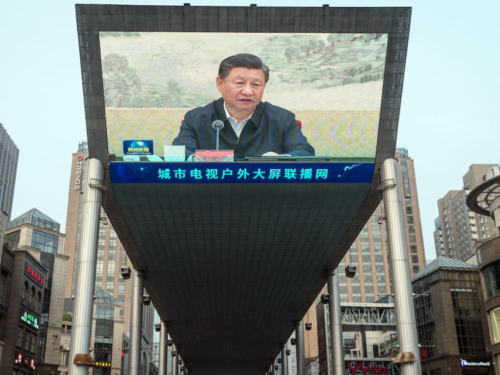 A screen shows a news broadcast of Chinese President Xi Jinping in Beijing, China, on Saturday, June 26, 2021. 