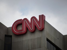 CNN signage is displayed at the network's headquarters building in Atlanta, Georgia, U.S., on Friday, Aug. 1, 2014. Time Warner is a "long, long way from a transaction," former Chief Executive Officer Richard Parsons said, adding the home of HBO, CNN and the Warner Bros. studio would be better off remaining independent.