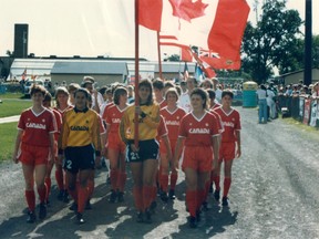 Canadian players including Carla Chin and Sue Redepenning-Simon march onto the field before one of their two 1986 games in the U.S. North American Cup (at the Sons of Norway youth tournament)
7 July 1986 - Blaine, MN, USA
Photo: Canada Soccer.