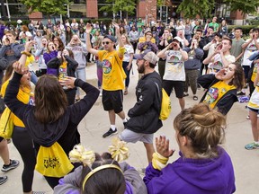 Laurier Brantford students on the yellow team take part in a cheer-off on Wednesday September 4, 2019 during the annual mayor's lunch at Harmony Square in Brantford, Ontario.
