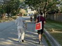 Liberal candidate Paul Chiang, left, walks alongside one of his volunteers in Markham Unionville, where the Liberals are trying to retake the riding from the Conservatives. Markham - Unionville is one of a handful of ridings in the GTA that did not go Liberal in 2019.
