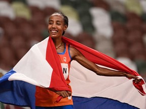 Netherlands' Sifan Hassan reacts after winning the women's 5000m final.