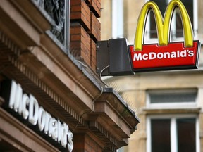 A McDonald's fast food store in central London. (Photo by Ben STANSALL / AFP)