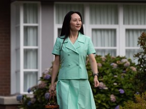 Meng Wanzhou, chief financial officer of Huawei, leaves home to attend her extradition hearing at B.C. Supreme Court, in Vancouver, on Monday, August 9, 2021.