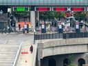 A traveller walks across the Rainbow Bridge in Niagara Falls, Ontario.